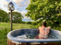 Geodome with wood-fired hot tub