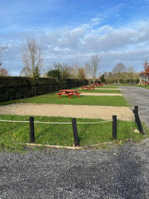 Bronze electric hardstanding & grass pitch