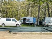 The Glade campervan gravel pitch