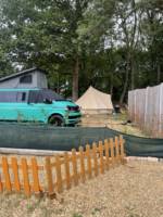 The Glade campervan gravel pitch