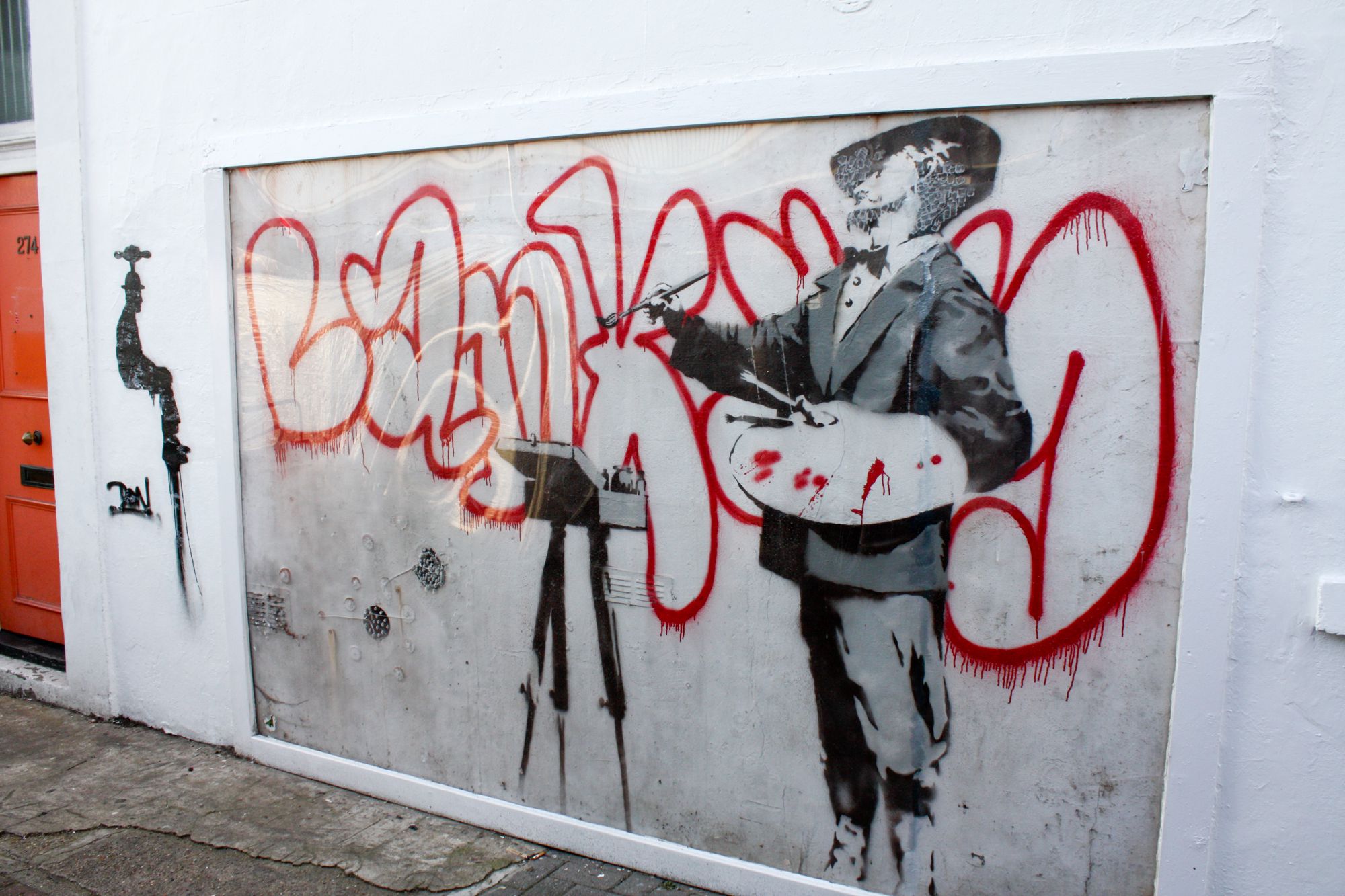 Banksy graffiti art essay image