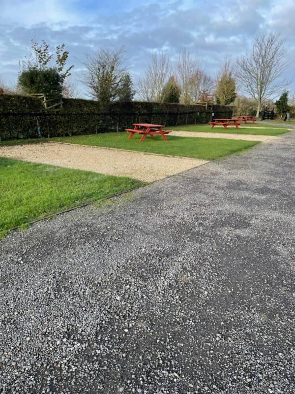 Bronze electric hardstanding & grass pitch