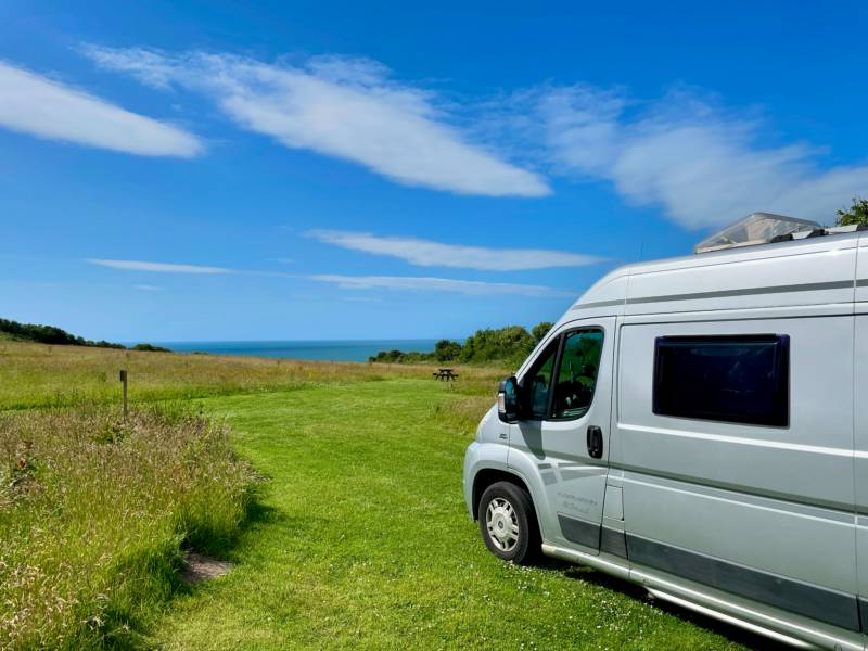 Campervan / Meadow grass tent pitch