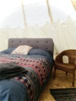 Child-free tipi glamping in a Norfolk meadow
