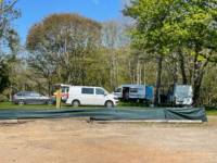 The Glade campervan gravel pitch